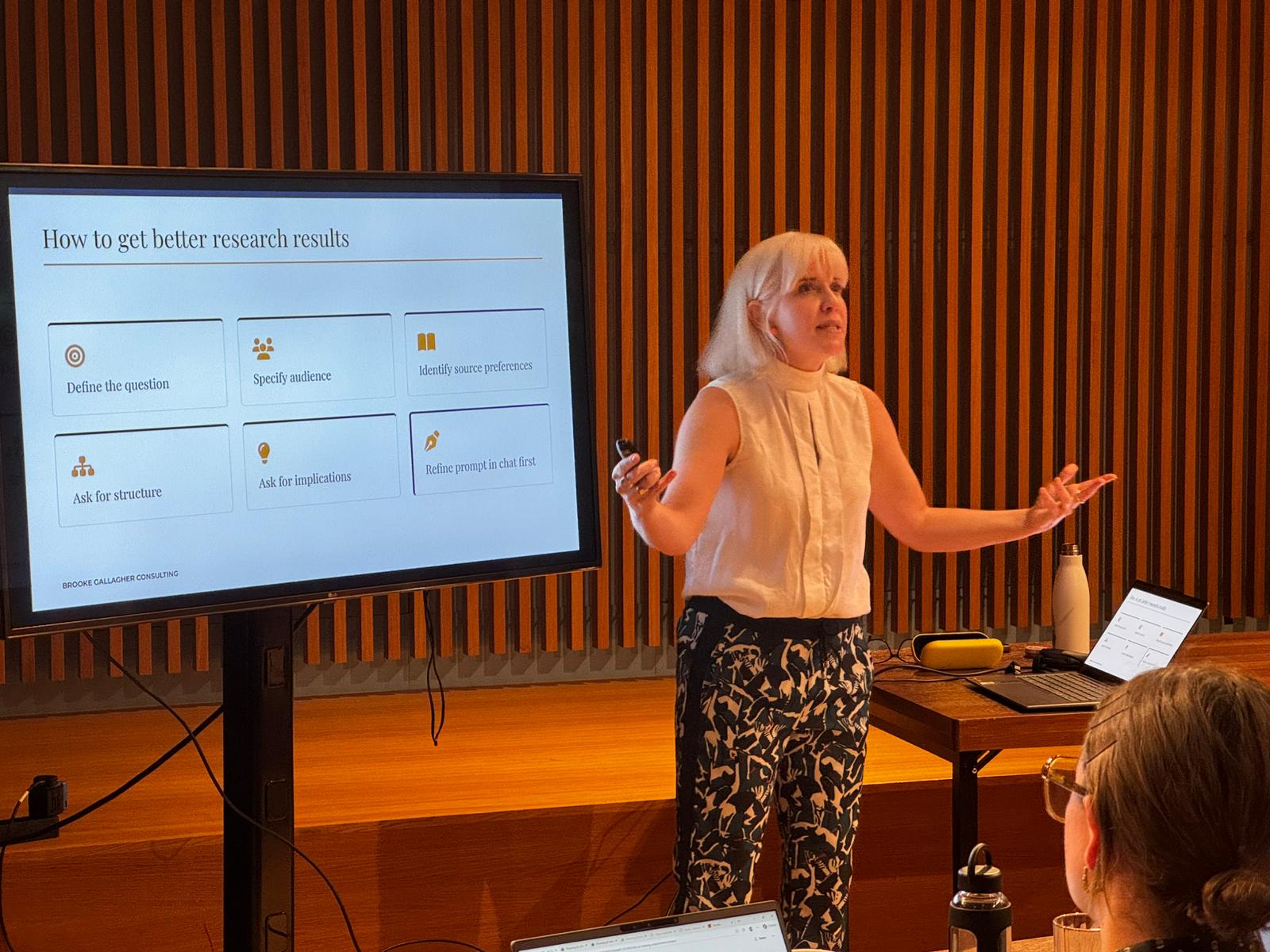 Brooke Gallagher presenting an AI training session
